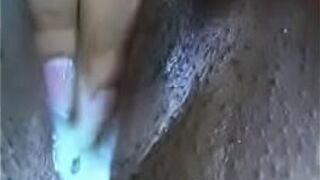Horny ebony babe toys her creamy pussy close up - porn video